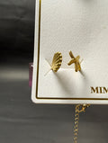 Open ring featuring a textured seashell and a small starfish motif